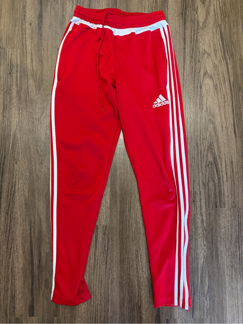 Red Adidas track pants